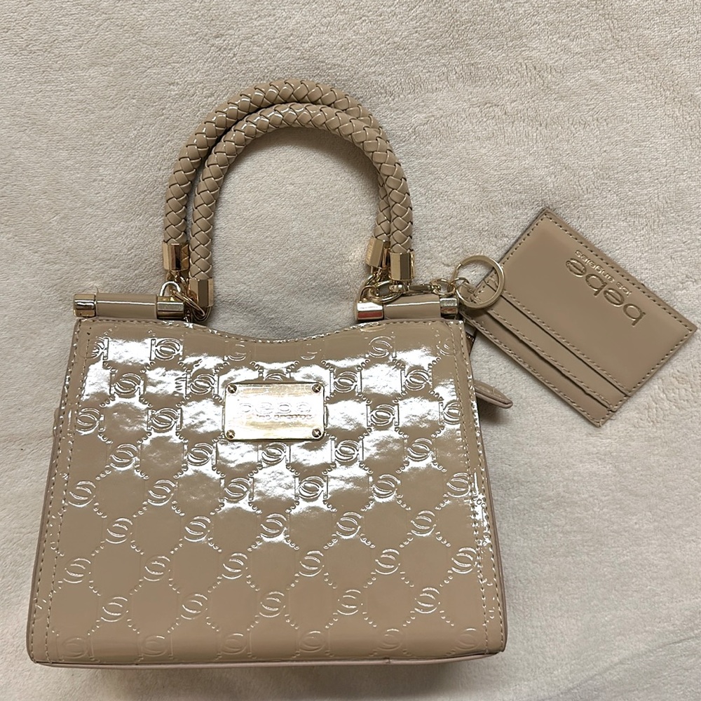 BEBE champagne purse! In excellent condition